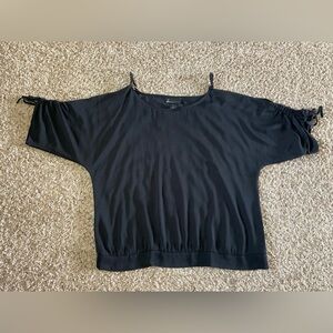 Lane Bryant black Top,size 16 cut outs on the shoulders, gold detail